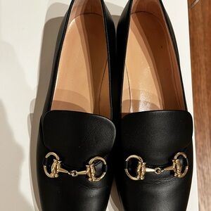 Gucci Black Leather Women's Loafers with Gold Bit Accent